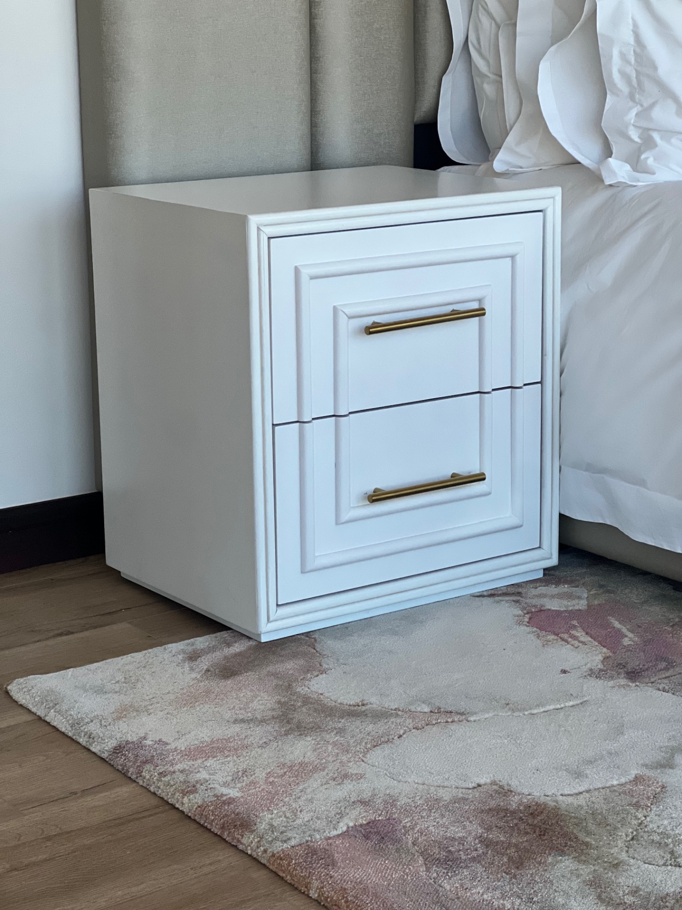 Bespoke white lacquered bedside pedestal with brass handles